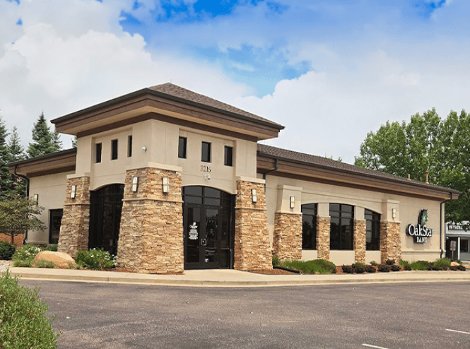 OakStar Bank's Colorado Springs branch at 3216 W Colorado Avenue, seen from the parking lot.