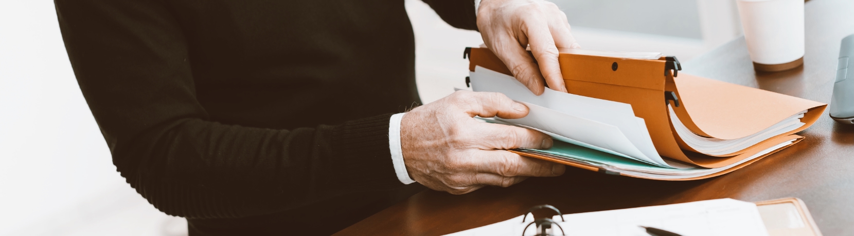 Man looking through documents