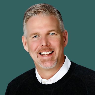 Professional photo of OakStar Bank Southwest Missouri Vice President of Mortgage Banking, Aaron Jernigan.