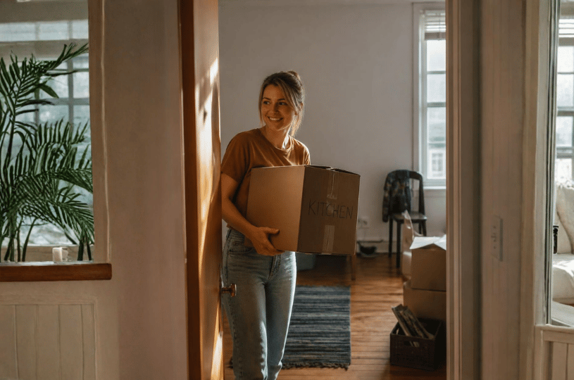 A young adult moving into a new home and preparing for independent living.