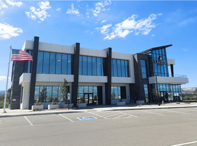 OakStar Bank's Grand Junction branch at 1351 Riverfront Loop, seen from the parking lot.