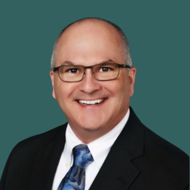 Professional photo of OakStar Bank Southwest Missouri Vice President of Mortgage Banking, John George.