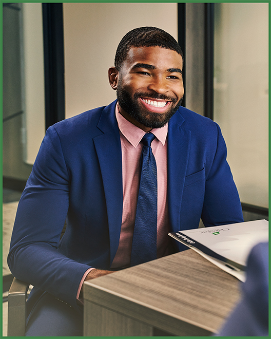 A business owner growing savings with an OakStar Bank Business Savings account.