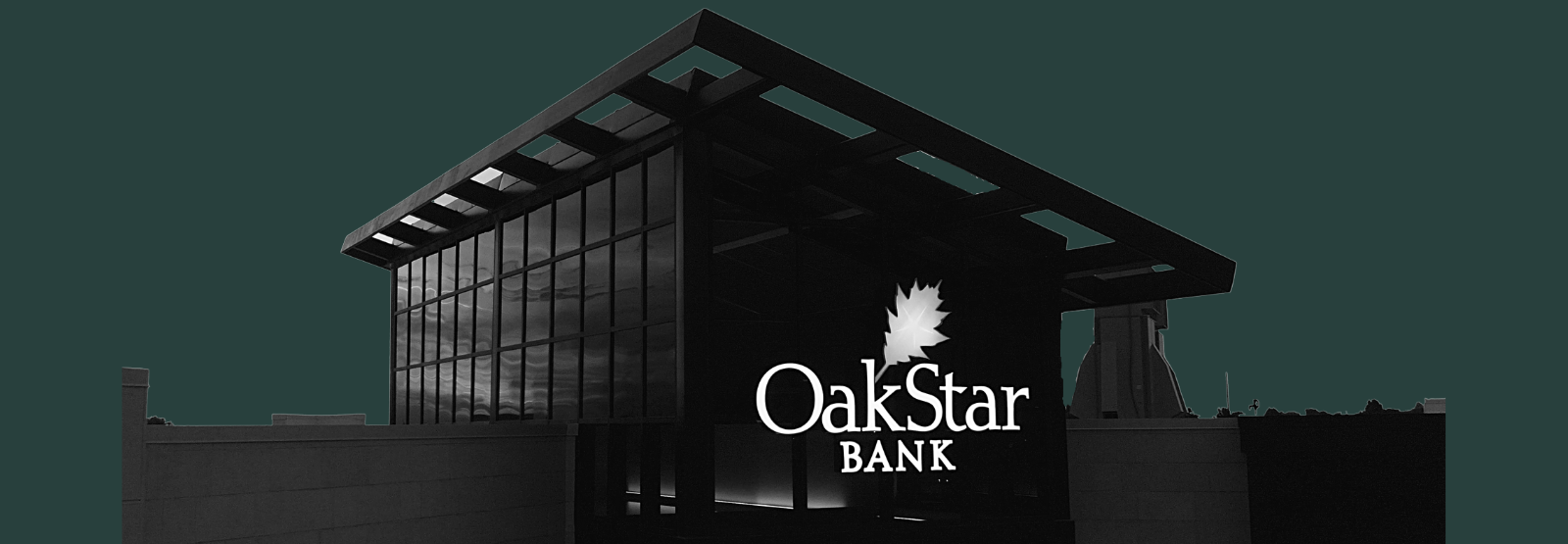 OkaStar Bank exterior dark shot