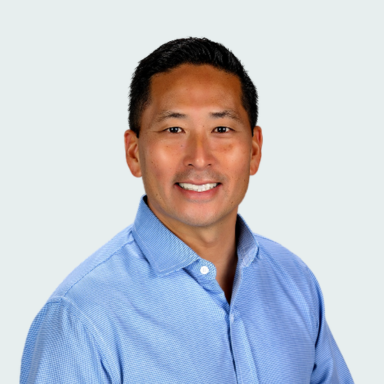 A professional headshot of Eugene Han, General Council at OakStar Bank.