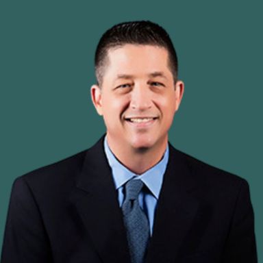 Professional photo of OakStar Bank Kansas City Vice President of Mortgage Banking, Joe Grego.