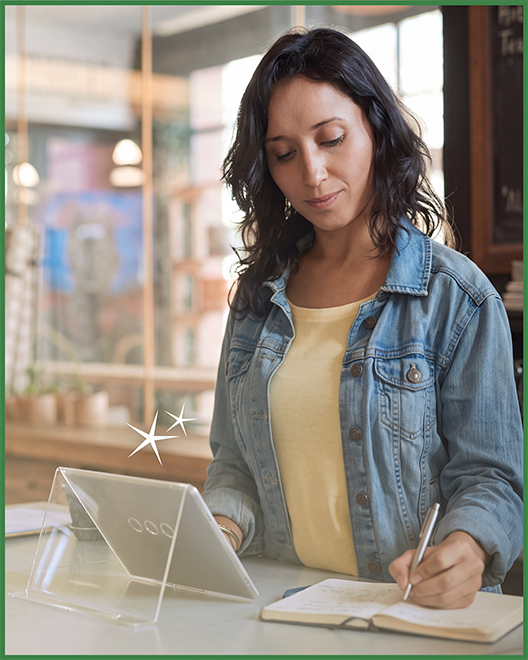 A business owner managing account activity with an OakStar Bank Business Analysis Checking account.
