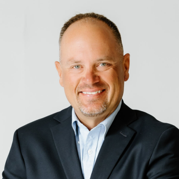 A professional headshot of Trevor Johnson, a Community Bank President for Grand Junction, Colorado.
