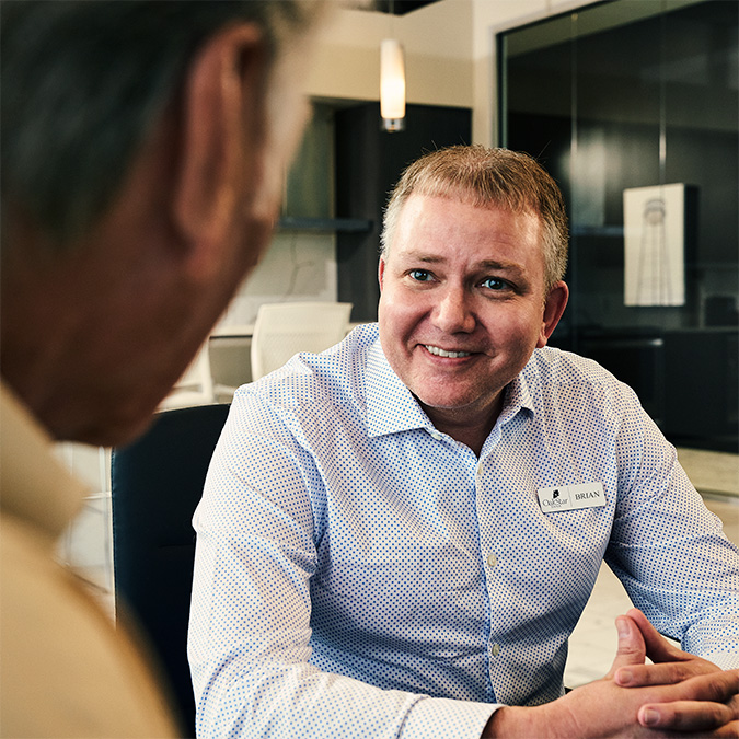 An OakStar Bank team member discussing financial goals with a client.