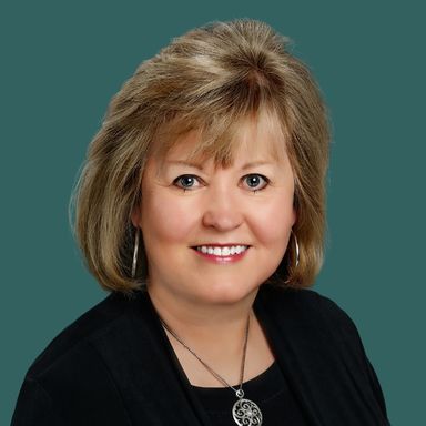 Professional photo of OakStar Bank Southwest Missouri Vice President of Mortgage Banking, Vicki Reser.