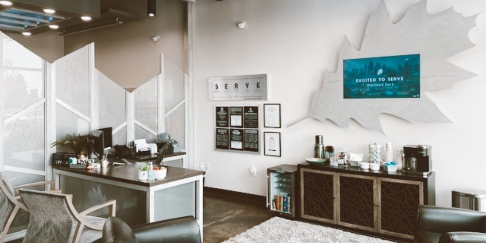 Interior shot of the refreshment station and desk in OakStar bank