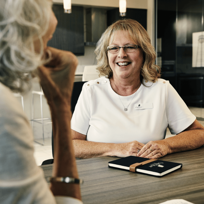 An OakStar Bank team member helping a business owner prepare for SBA financing.