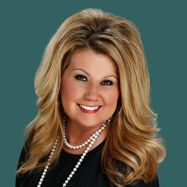 Professional photo of OakStar Bank Southwest Missouri Vice President of Mortgage Banking, Denise Feldt.