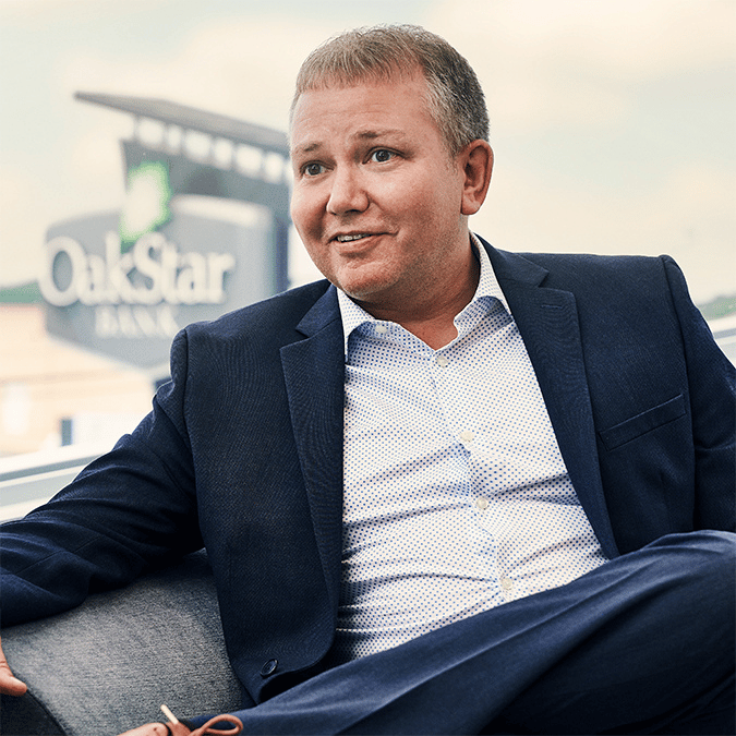 An OakStar Bank team member contributing to a collaborative workplace culture.