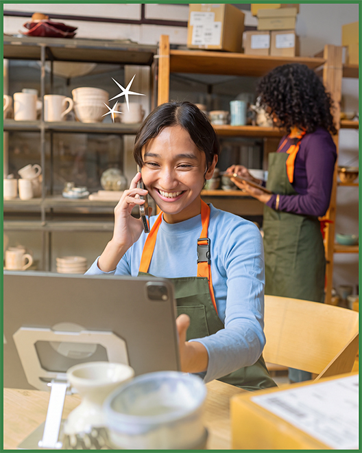 A business owner managing daily operations with an OakStar Bank Small Business Checking account.
